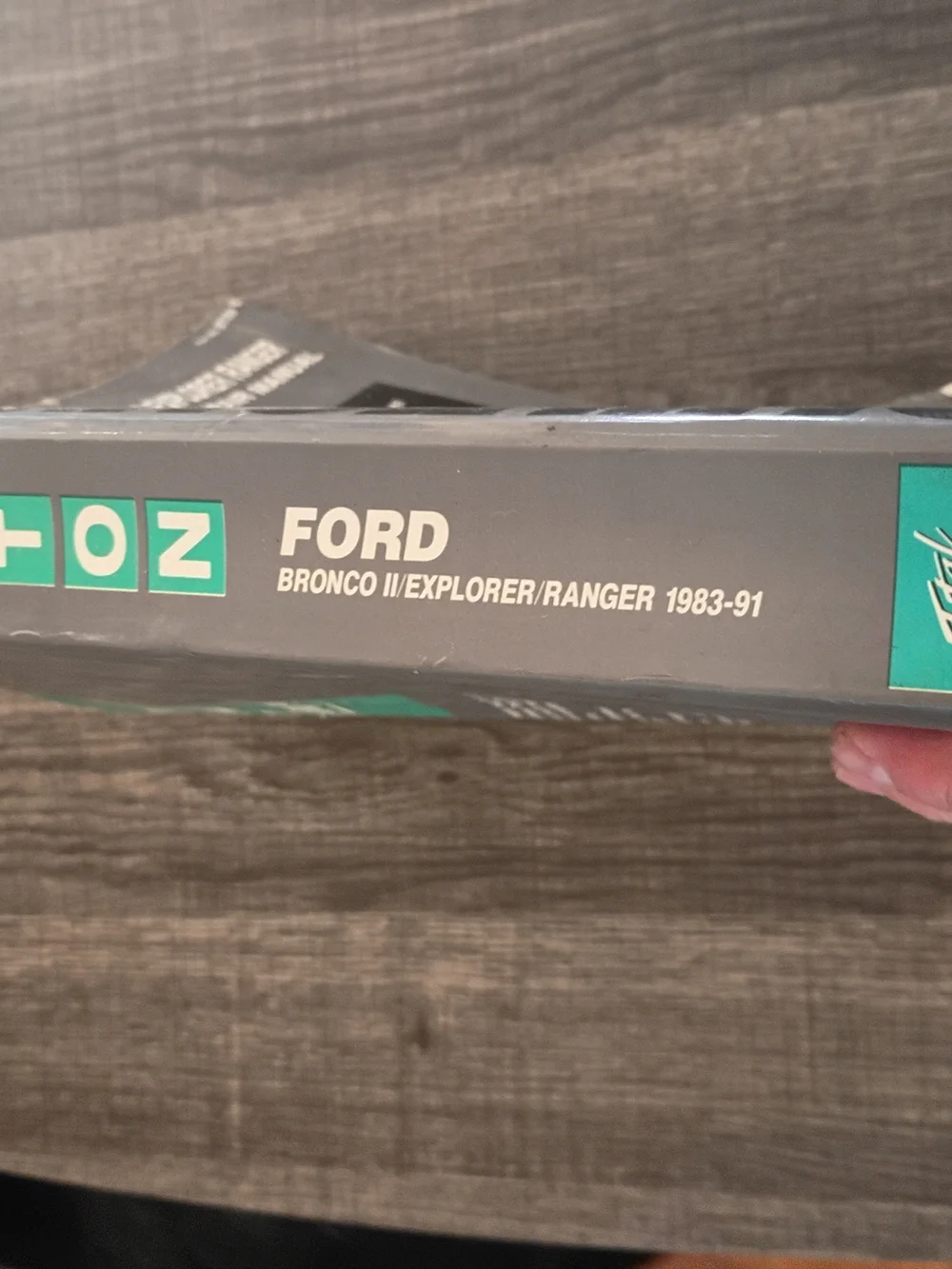 Ford Black and Teal Automotive Repair Manual Cover